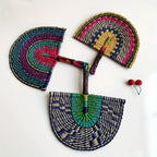 Three woven straw hand fans with wrapped handles