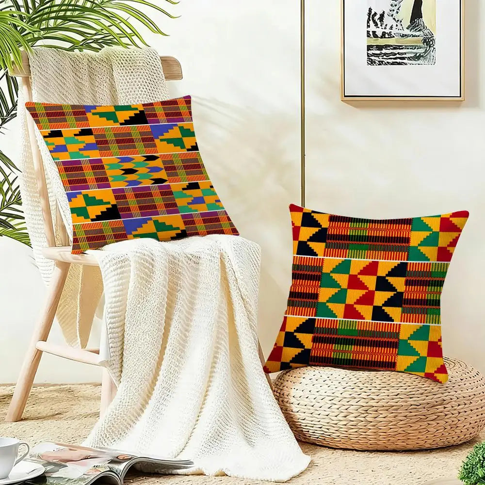 Kente pattern cushion covers on a chair and pouf