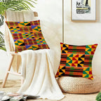 Kente pattern cushion covers on a chair and pouf
